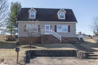 Cape Cod style home with brick foundation and dormers in Pleasant Hill Acres, Harrisonburg VA